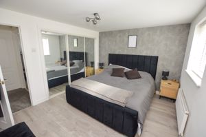 Bedroom One- click for photo gallery